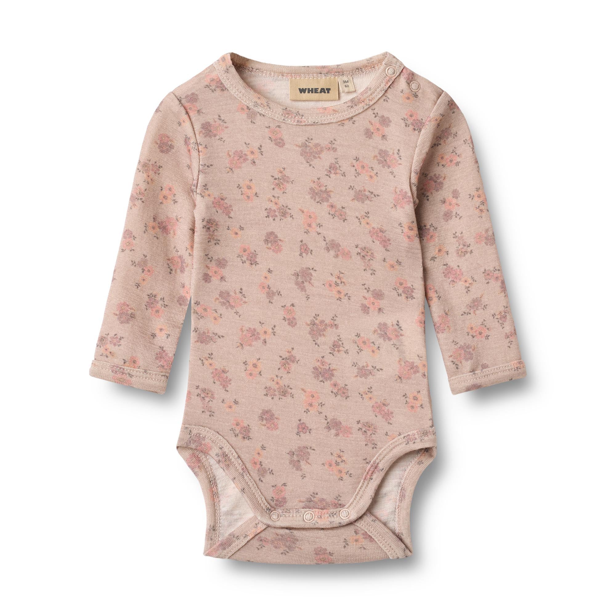 Wheat wollen romper roze bloemen