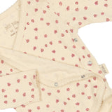 beige romper roze bloemen