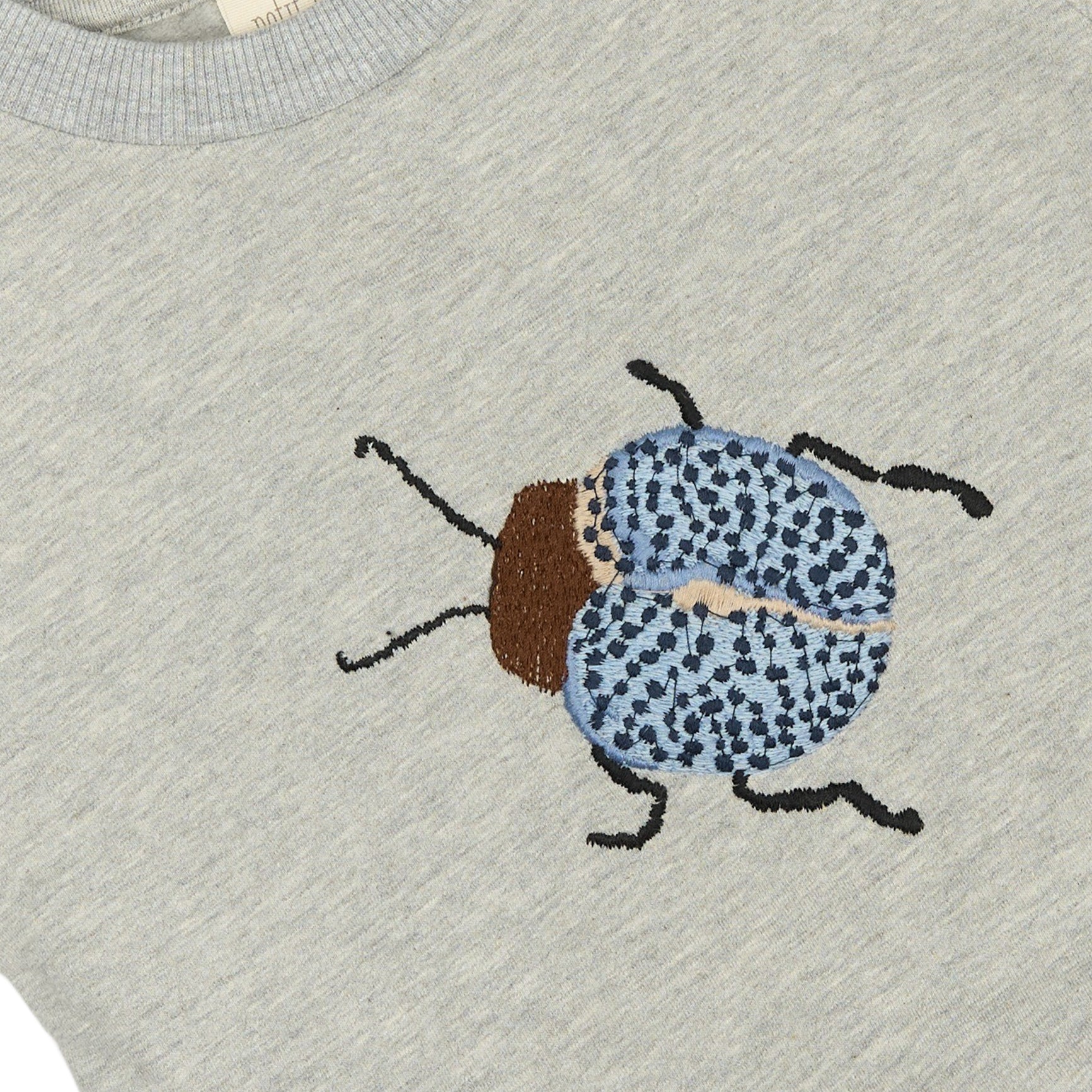 Petit piao grijze trui blauw detail