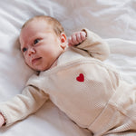 thats meine beige romper met rood hartje