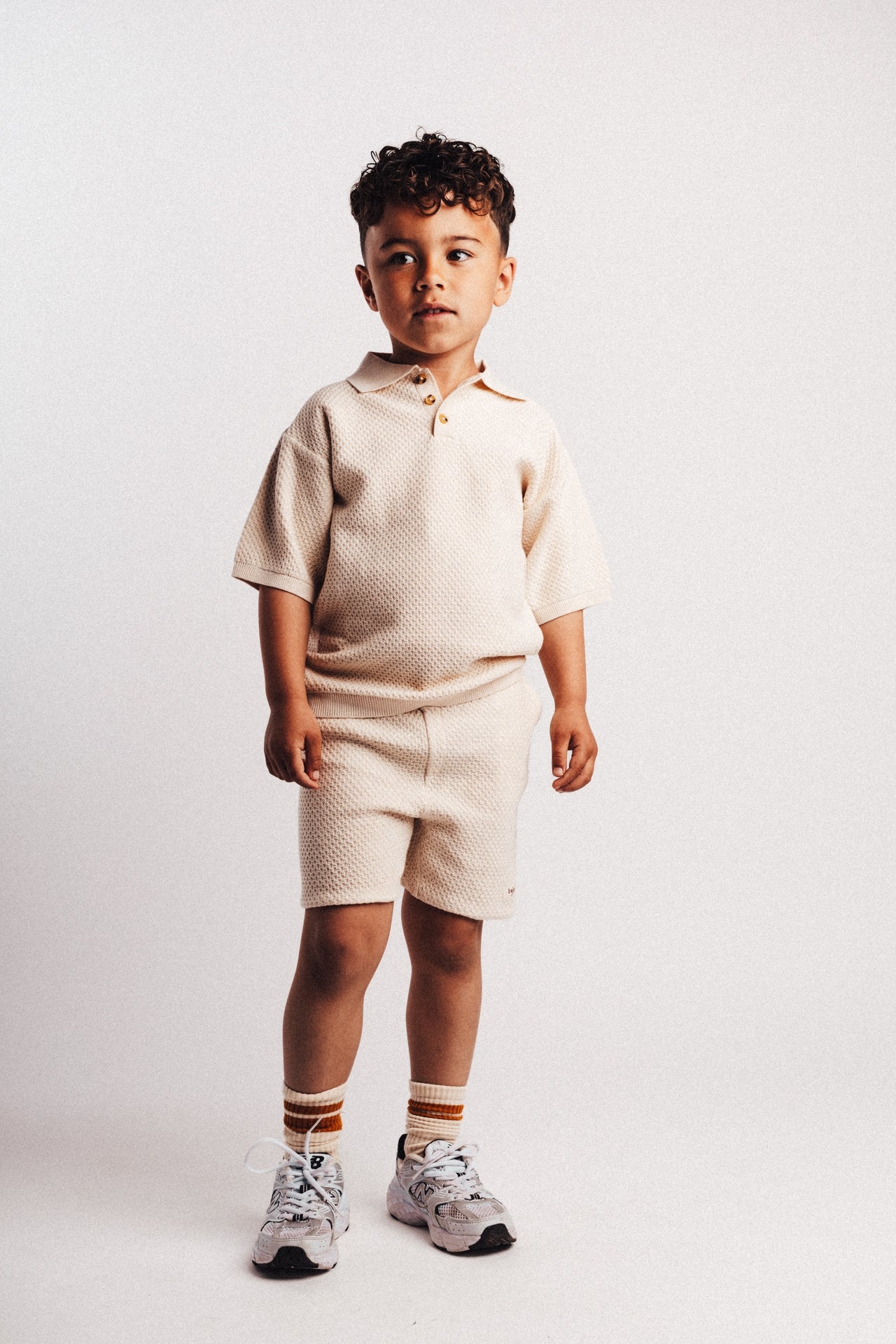 baje studio fygo polo beige korte mouwen gebreid