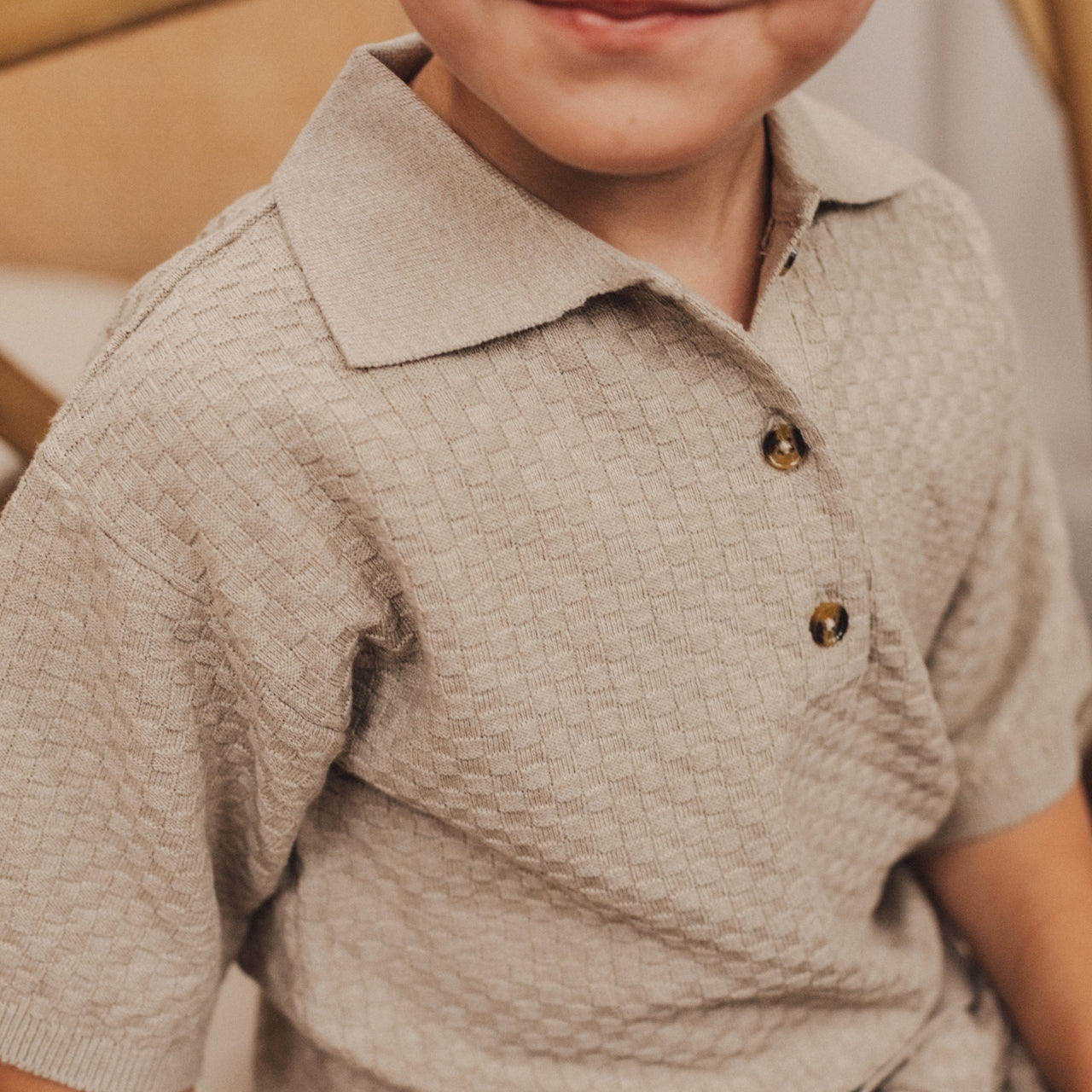 baje studio milo polo met knoopjes taupe