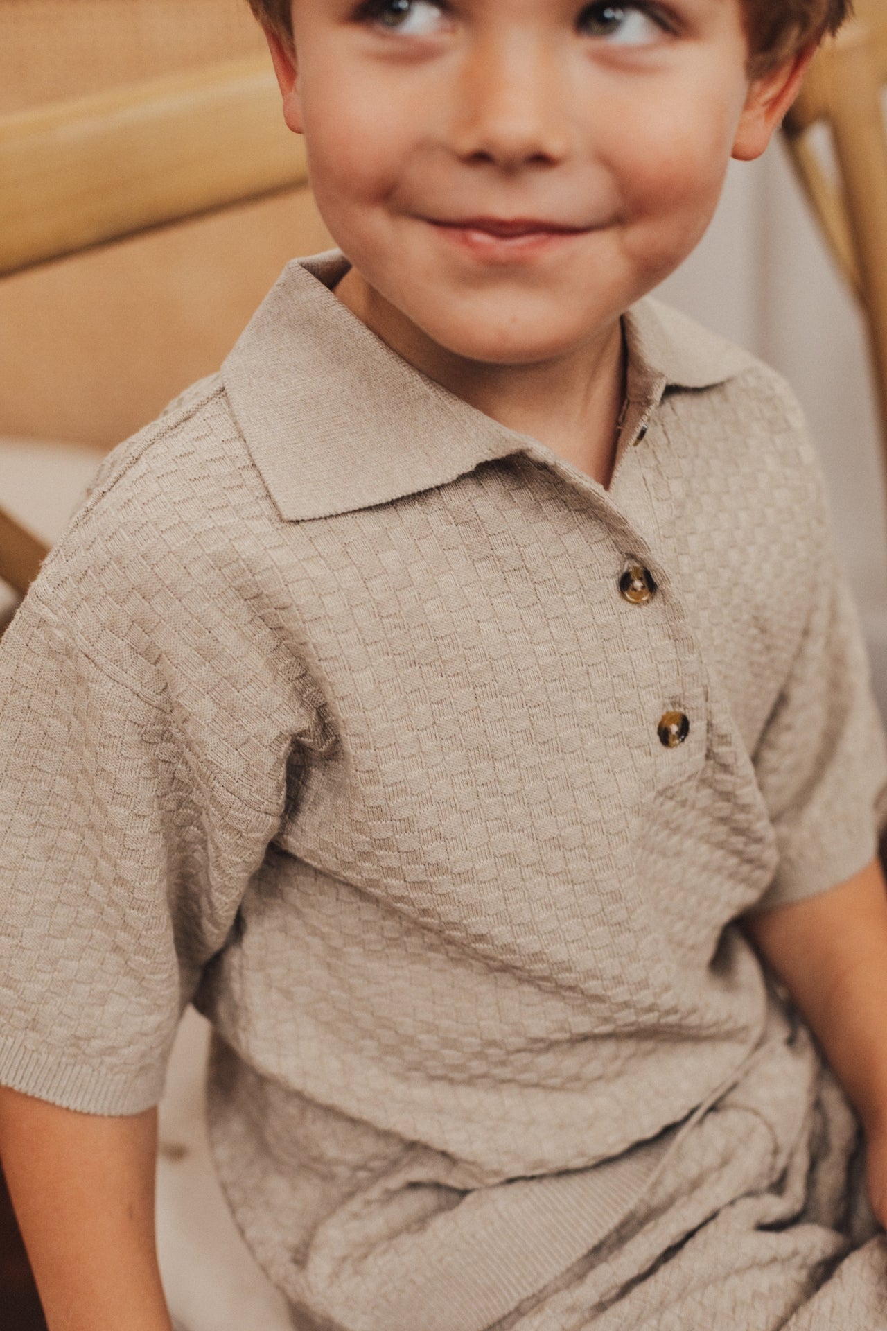 baje studio milo polo met knoopjes taupe